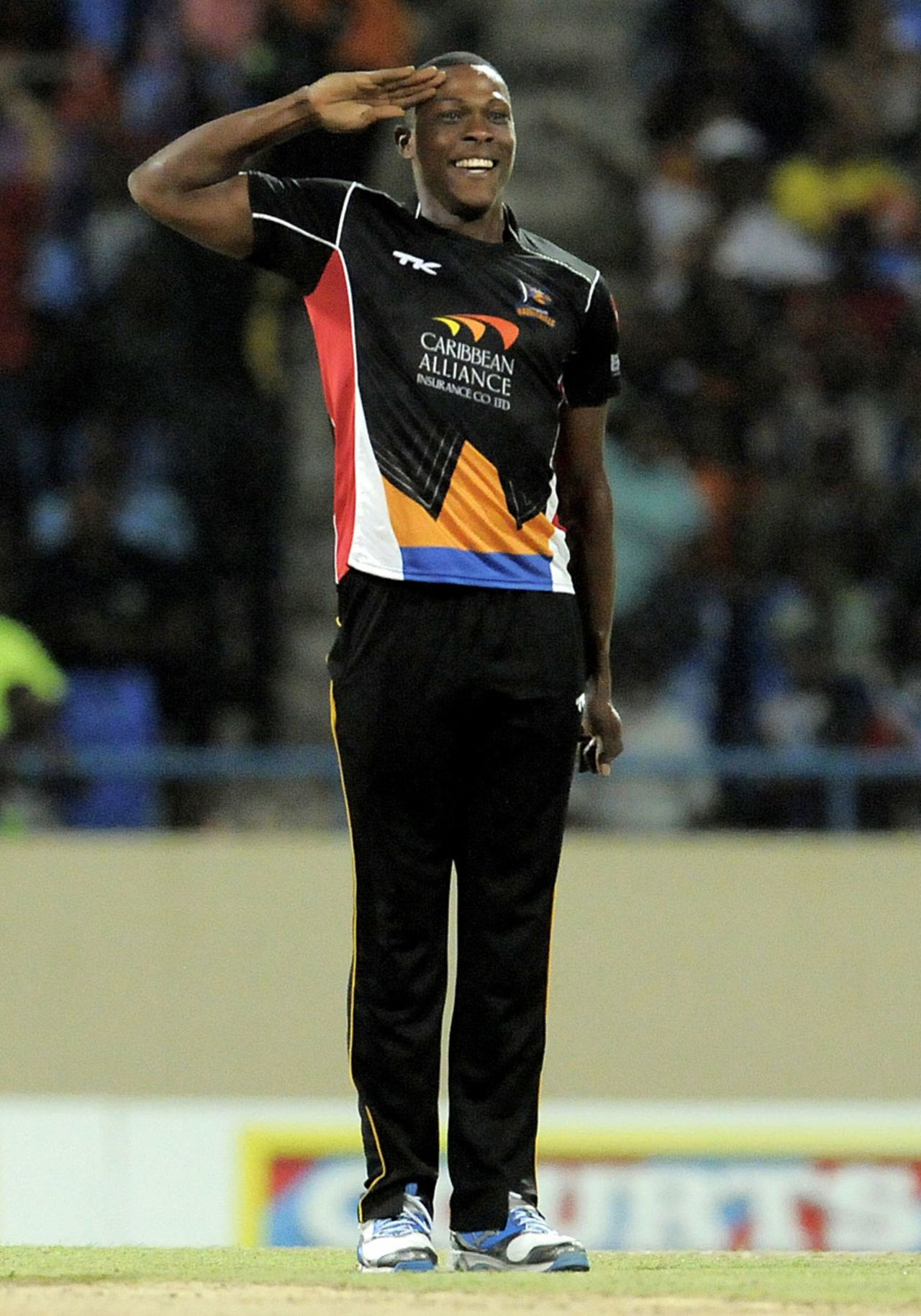 Sheldon Cotterrell salutes the crowd after taking a wicket, Antigua Hawksbills v Barbados Tridents, CPL, North Sound, August 13, 2013