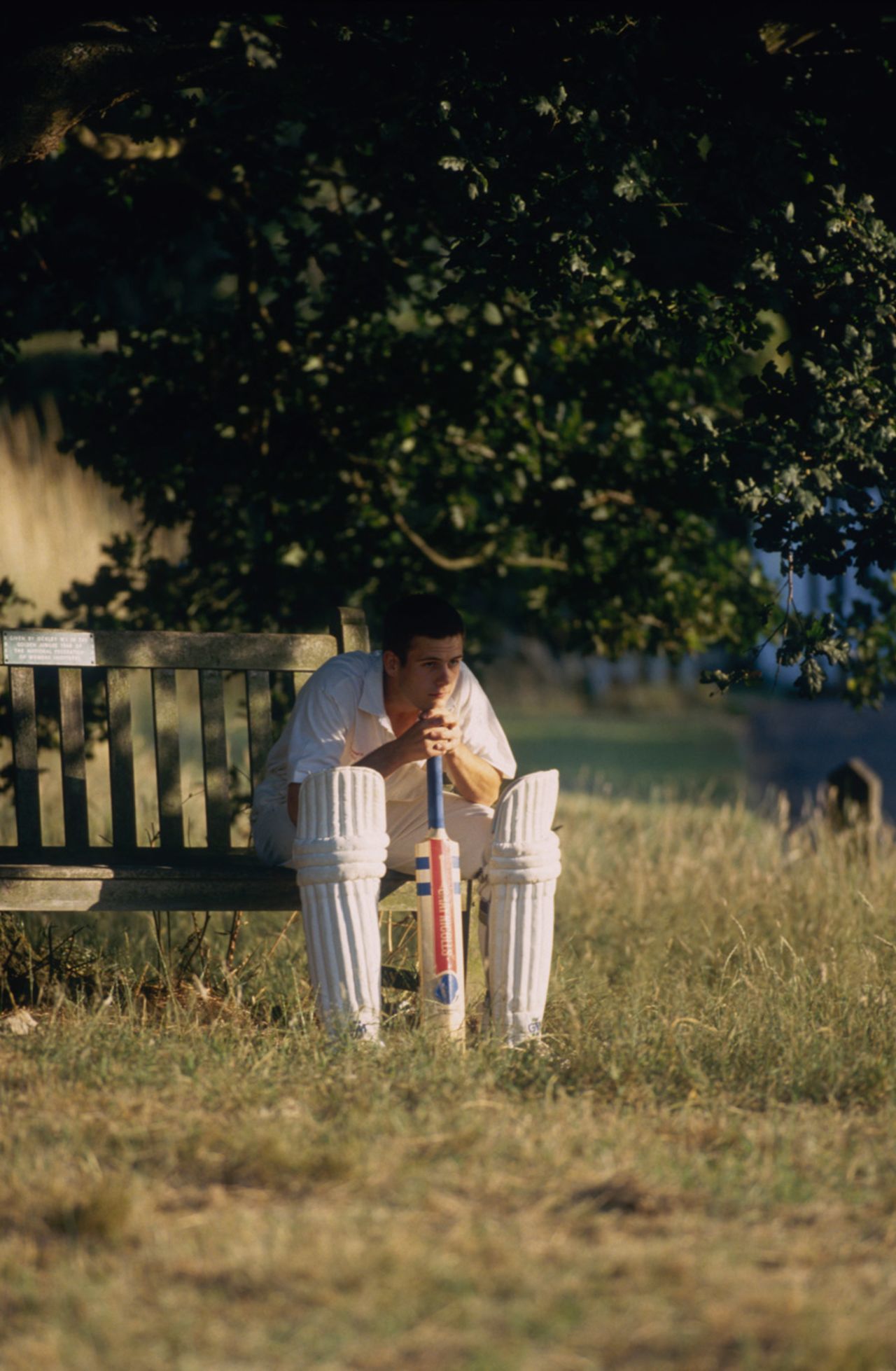 A batsman in a village cricket match, Surrey, England, July 22, 1995