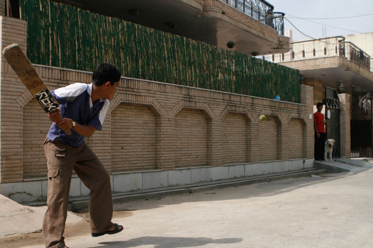Children play outside Virender Sehwag's house in Najafgarh, Delhi, March 31, 2007