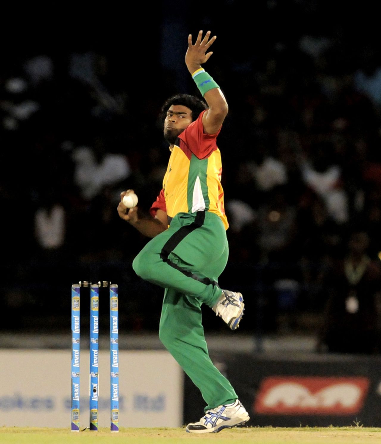 Lasith Malinga in his delivery stride, Trinidad & Tobago Red Steel v Guyana Amazon Warriors, Caribbean Premier League 2013, 1st semi-final, Port-of-Spain, August 22, 2013