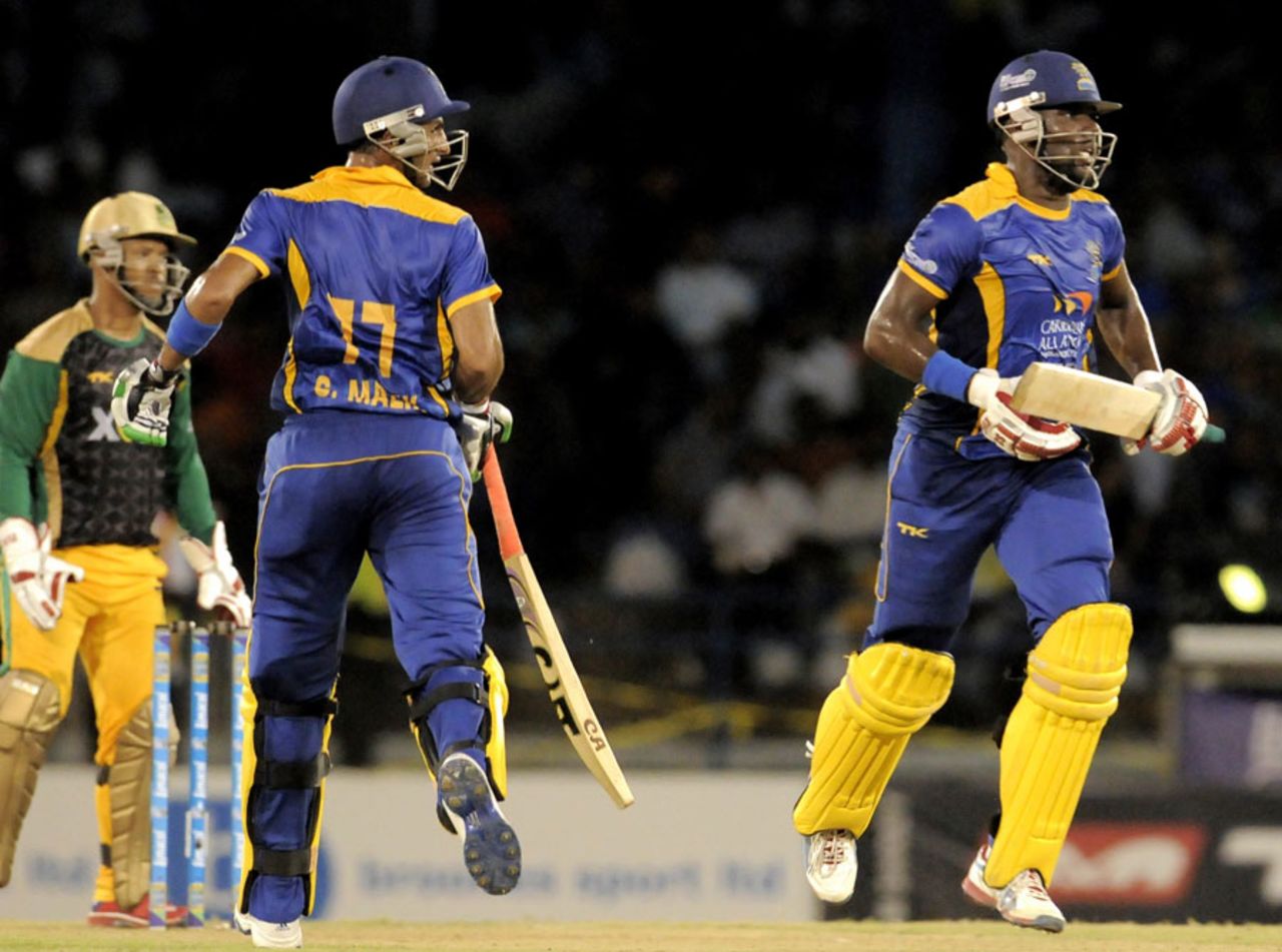 Shoaib Malik and Raymon Reiffer added 102 for the third wicket, Jamaica Tallawahs v Barbados Tridents, Caribbean Premier League 2013, semi-final, Port-of-Spain, August 23, 2013