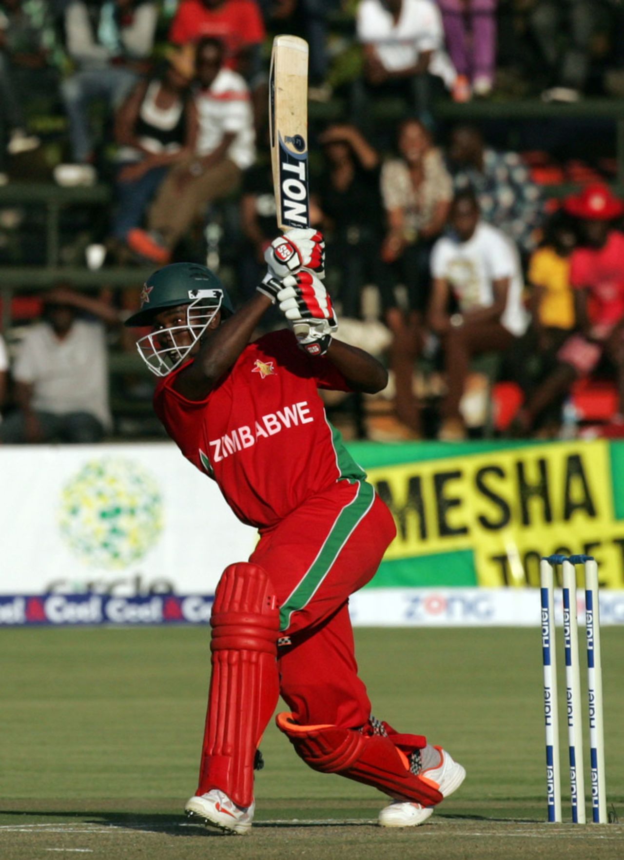 Elton Chigumbura strikes the ball straight over the top, Zimbabwe v Pakistan, 2nd T20I, Harare, August 24, 2013