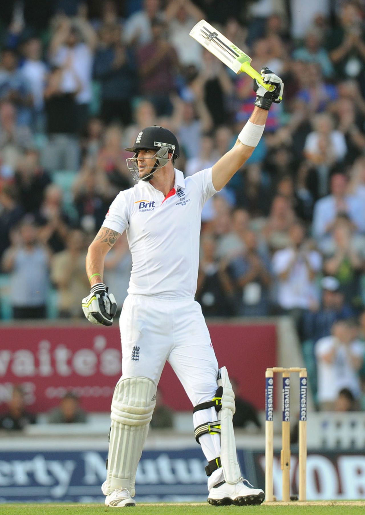 Kevin Pietersen raises his bat after making a half-century, England v Australia, 5th Investec Test, The Oval, 5th day, August 25, 2013