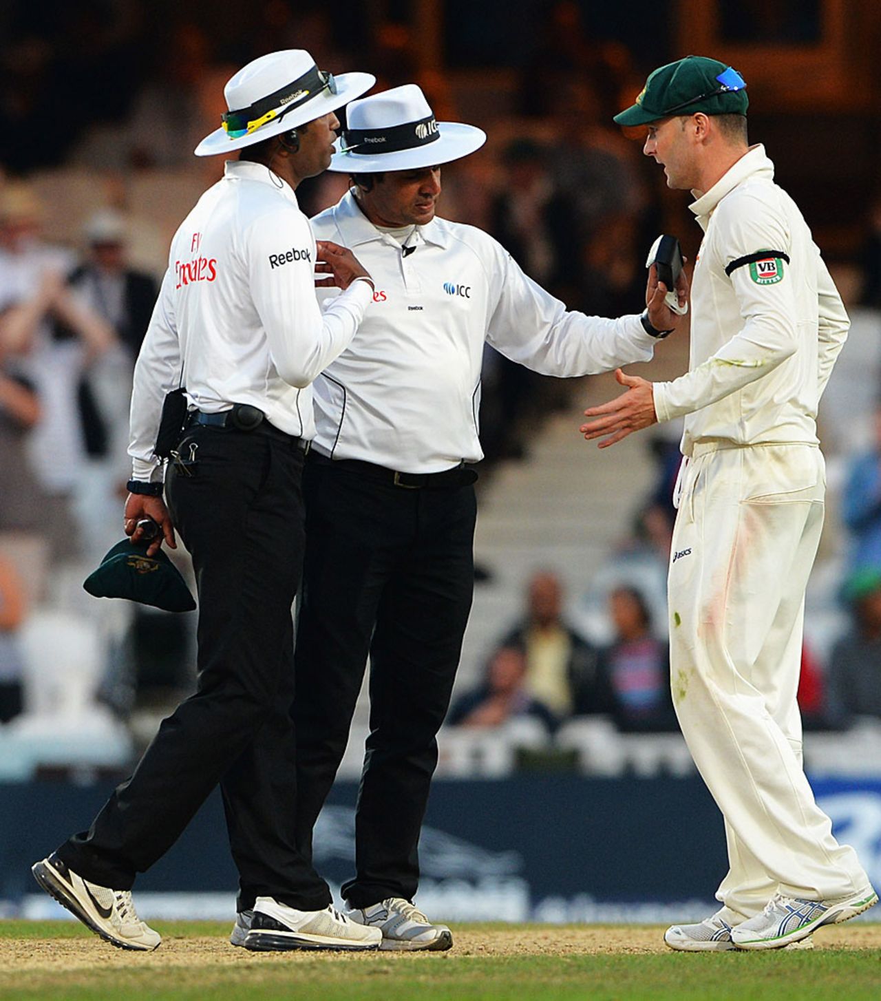 Kumar Dharmasena and Aleem Dar try to appease an agitated Michael Clarke, England v Australia, 5th Investec Test, The Oval, 5th day, August 25, 2013