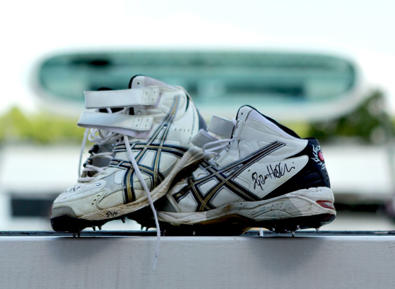 Ryan Harris' boots photographed in front of the pavilion, Lord's