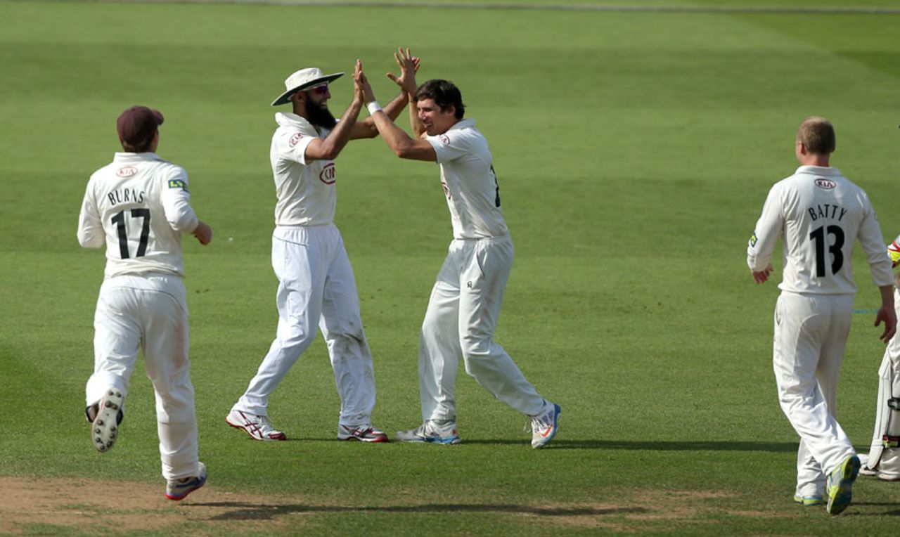 Zafar Ansari gets a high five from Hashim Amla, Surrey v Derbyshire, County Championship, Division One, The Oval, 1st day, August 29, 2013