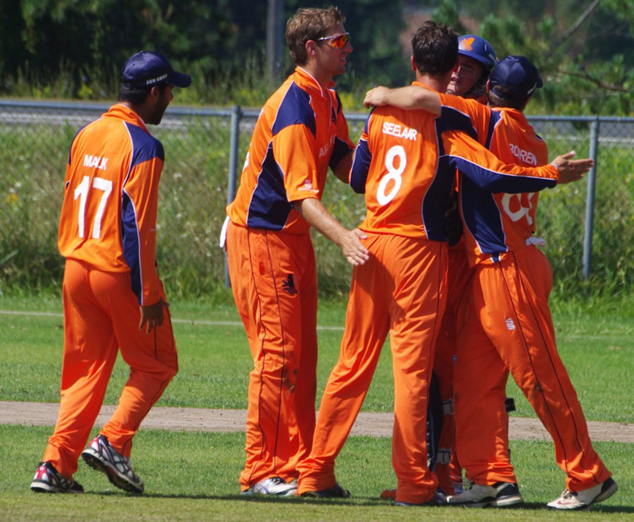Team-mates congratulate Netherlands bowler Pieter Seelaar, Canada v Netherlands, World Cricket League Championship, King City, August 29, 2013