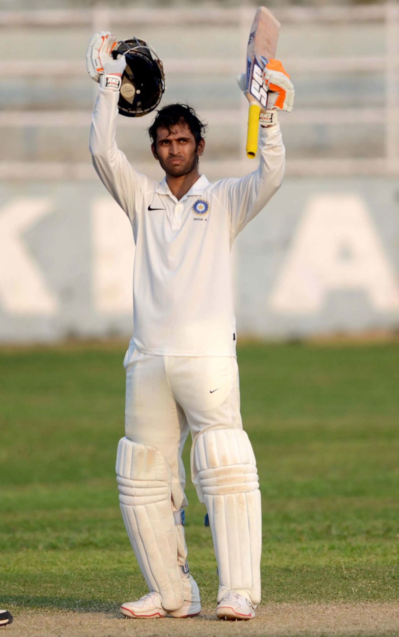 Abhishek Nayar raises his bat after reaching a century, India A v New Zealand A, 1st unofficial Test, day 3, Visakhapatnam, August 30, 2013
