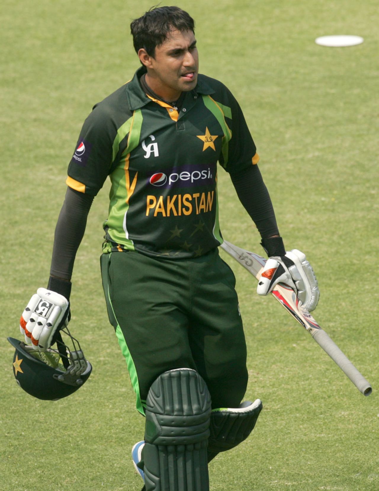 Nasir Jamshed trudges back to the pavilion after nicking one to the keeper, Zimbabwe v Pakistan, 3rd ODI, Harare, August 31, 2013