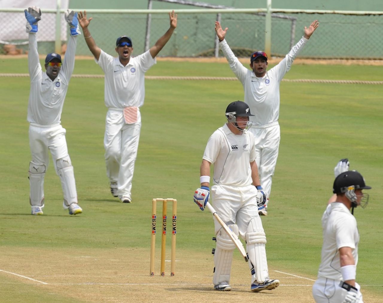 Indian players appeal for the wicket of Tom Latham, India A v New Zealand A, 2nd unofficial Test, Visakhapatnam, Sep 2, 2013