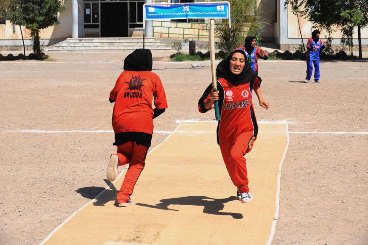 Afghanistan women set off for a quick single, Herat, September 2, 2013