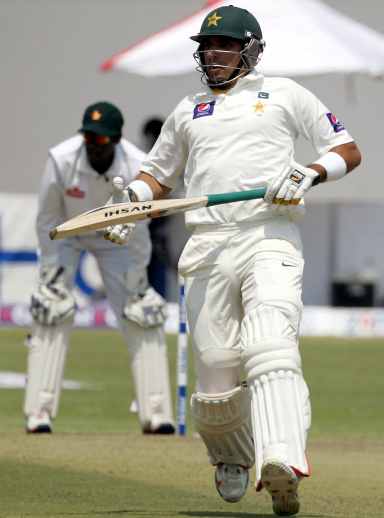 Misbah-ul-Haq completes a run, Zimbabwe v Pakistan, 1st Test, Harare, 1st day, September 3, 2013
