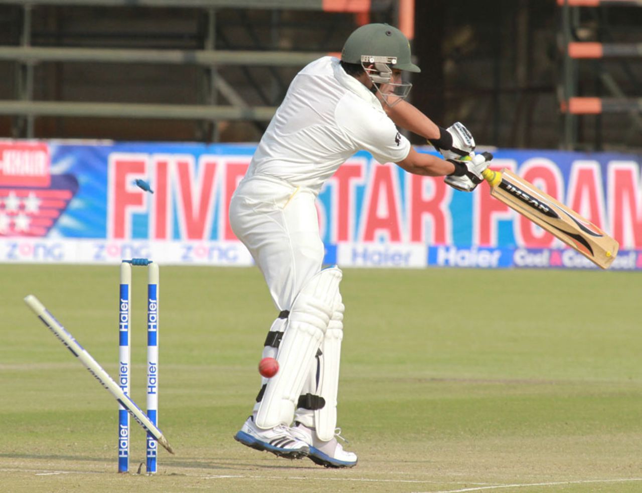 Adnan Akmal has his stump relocated by Tendai Chatara, Zimbabwe v Pakistan, 1st Test, Harare, 1st day, September 3, 2013