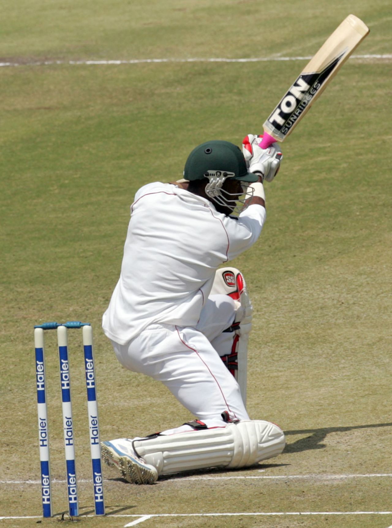 Vusi Sibanda drives on one knee through the covers, Zimbabwe v Pakistan, 1st Test, Harare, 2nd day, September 4, 2013