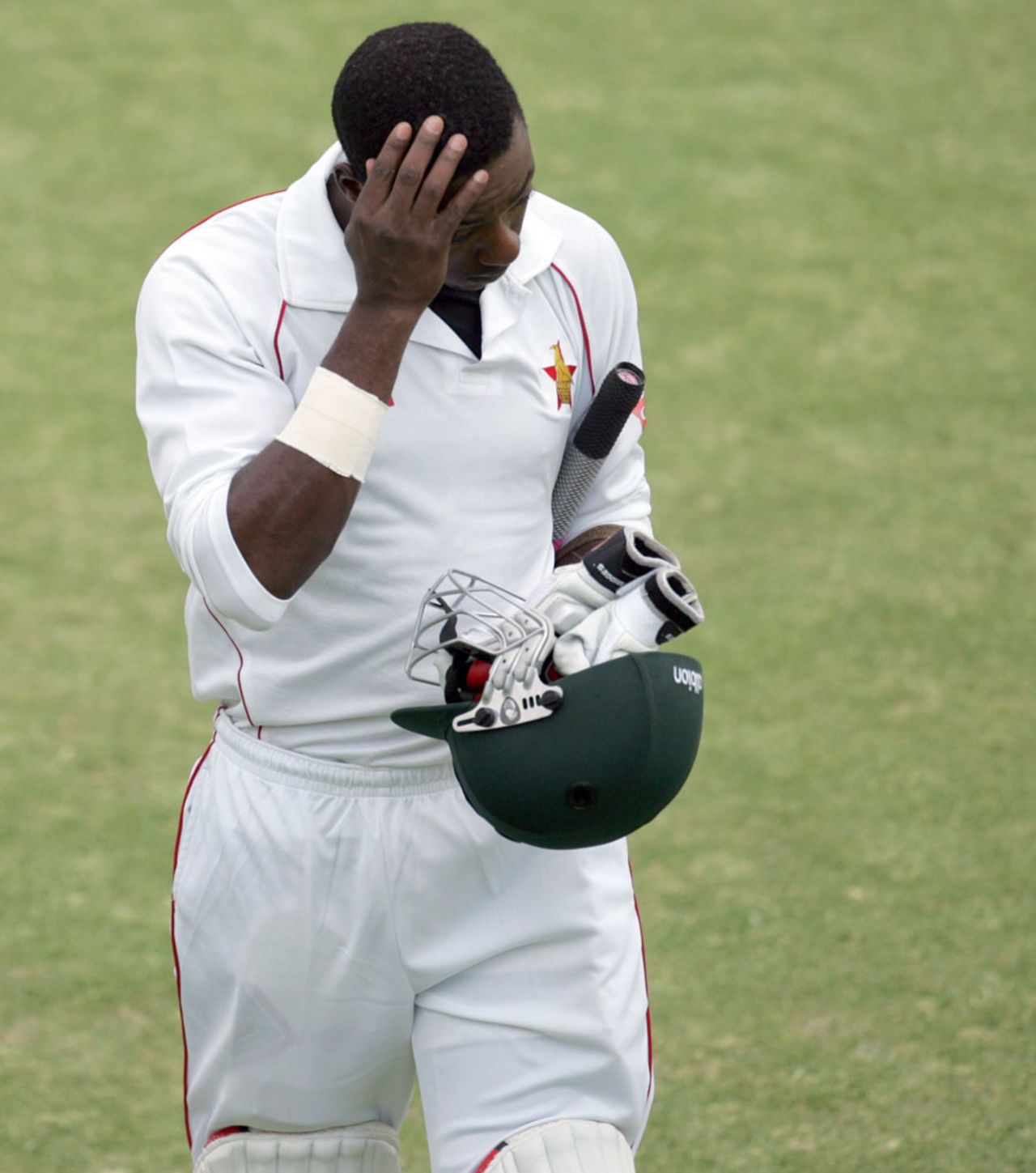 Vusi Sibanda walks back to the pavilion, Zimbabwe v Pakistan, 1st Test, Harare, 2nd day, September 4, 2013