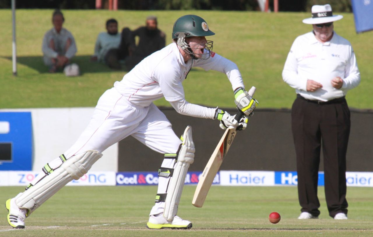 Malcolm Waller digs one out during his 70, Zimbabwe v Pakistan, 1st Test, Harare, 2nd day, September 4, 2013