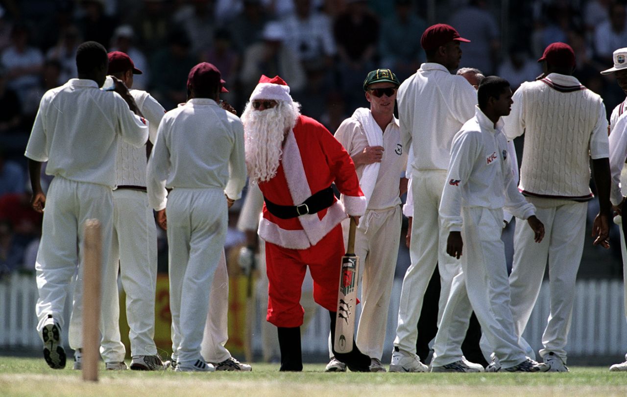 Santa Claus greets players on the field, Prime Minister's XI v West Indies, Canberra, December 7, 2000