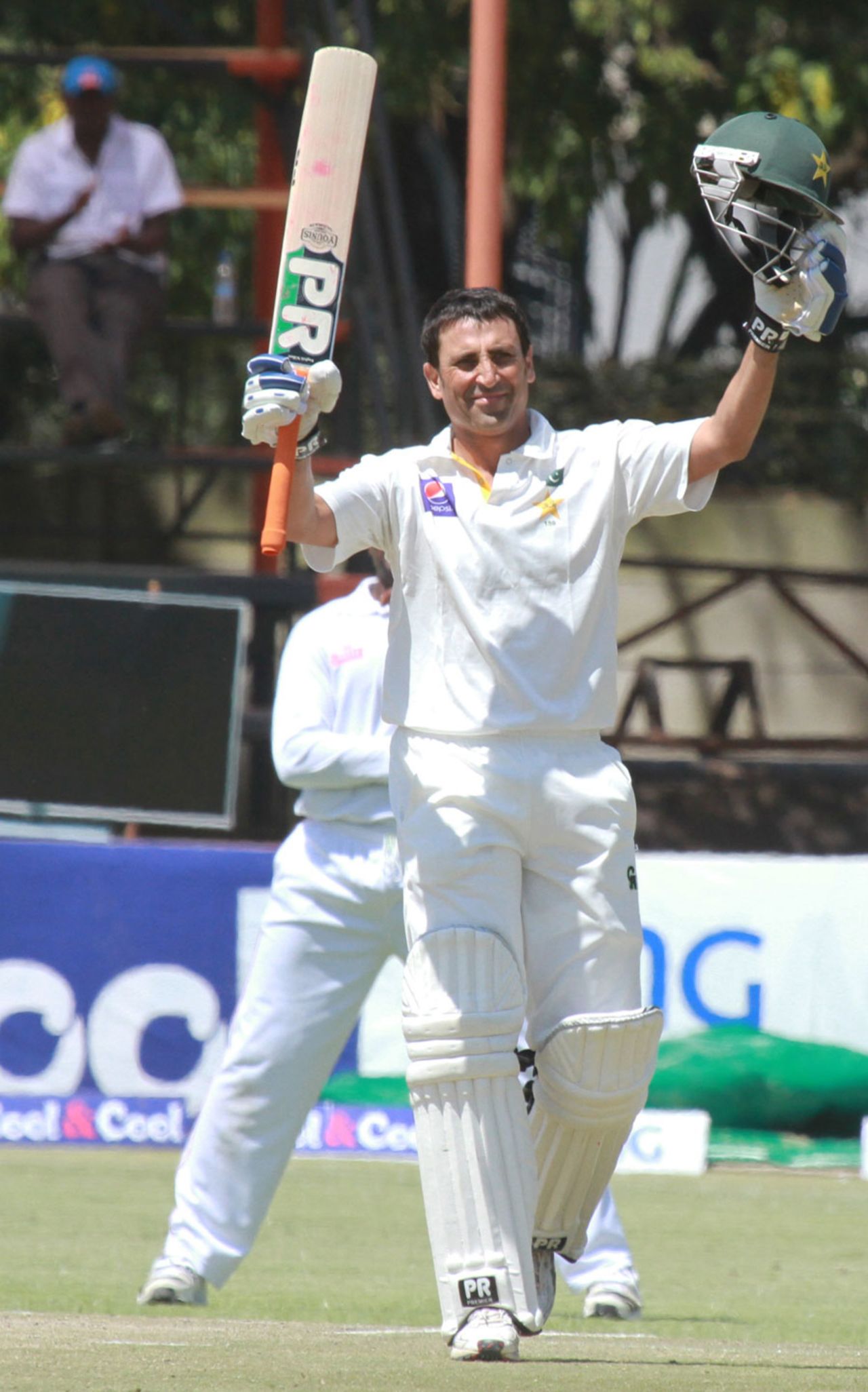 Younis Khan raises his bat after his first Test century against Zimbabwe, Zimbabwe v Pakistan, 1st Test, 4th day, Harare, September 6, 2013