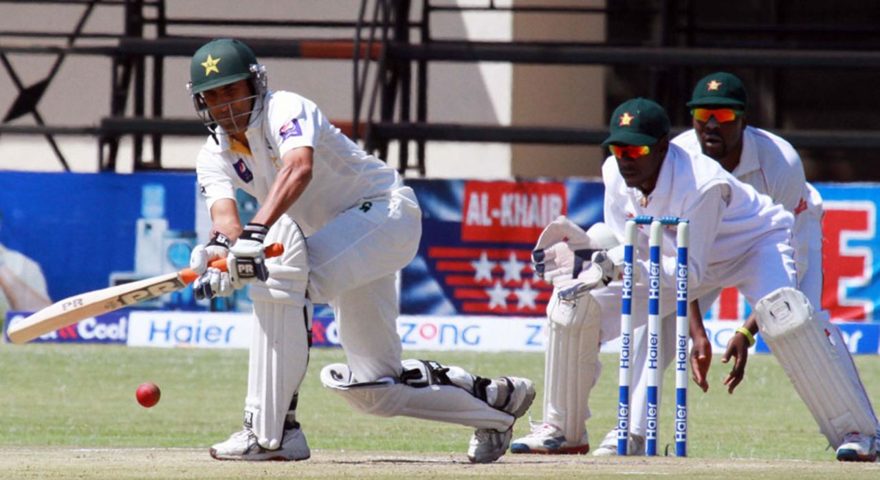 Younis Khan gets on the front foot to sweep , Zimbabwe v Pakistan, 1st Test, 4th day, Harare, September 6, 2013