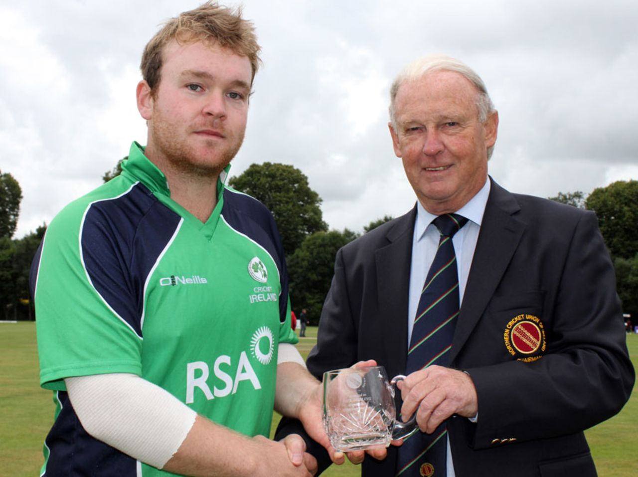 Paul Stirling receives a special award from Brian Walsh to mark his 100th international appearance, Ireland v Scotland, ICC World Cricket League Championship, Belfast, September 8, 2013