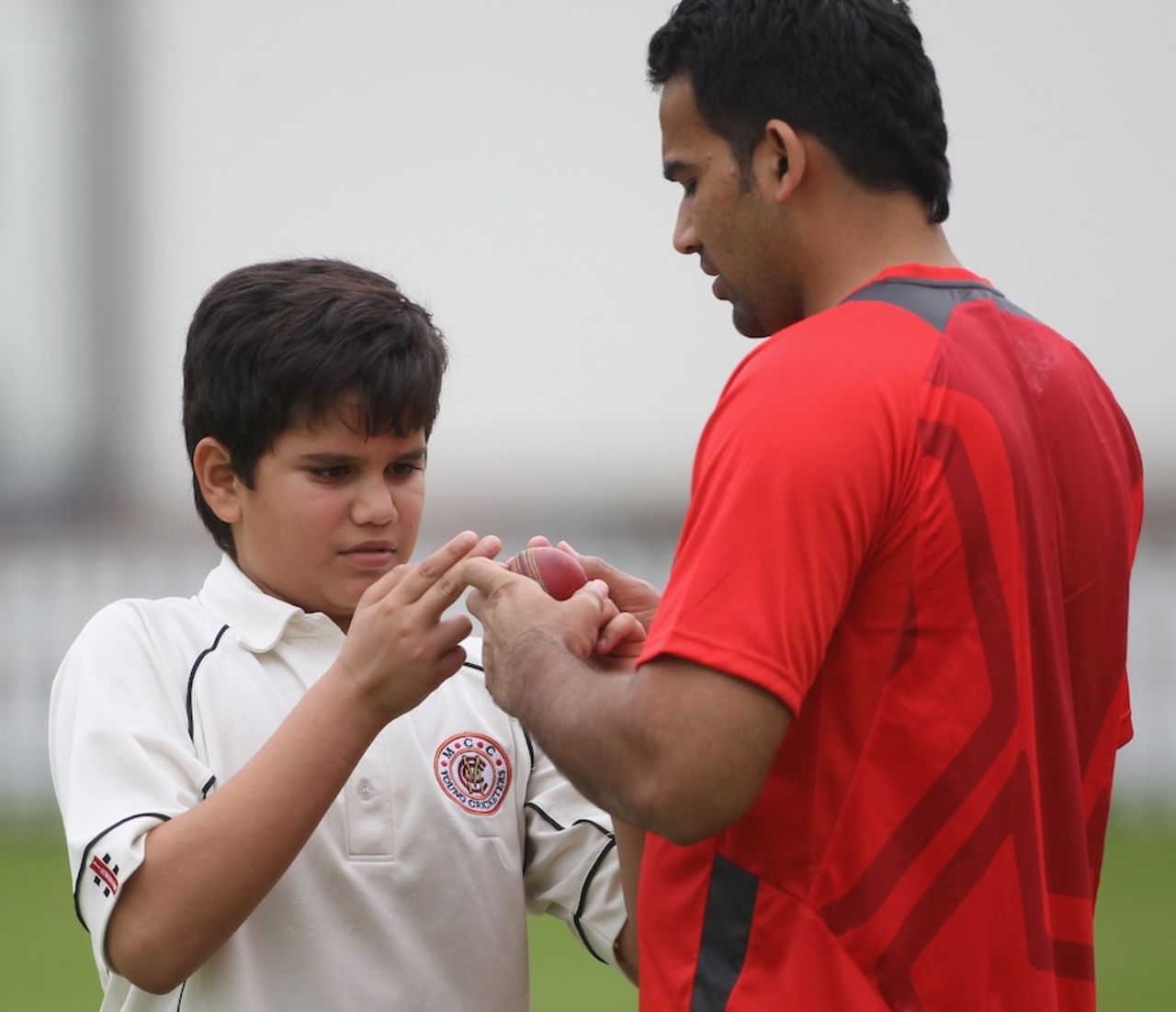Zaheer Khan chats with Sachin Tendulkar's son Arjun during a practice session, Lord's, July 20, 2011