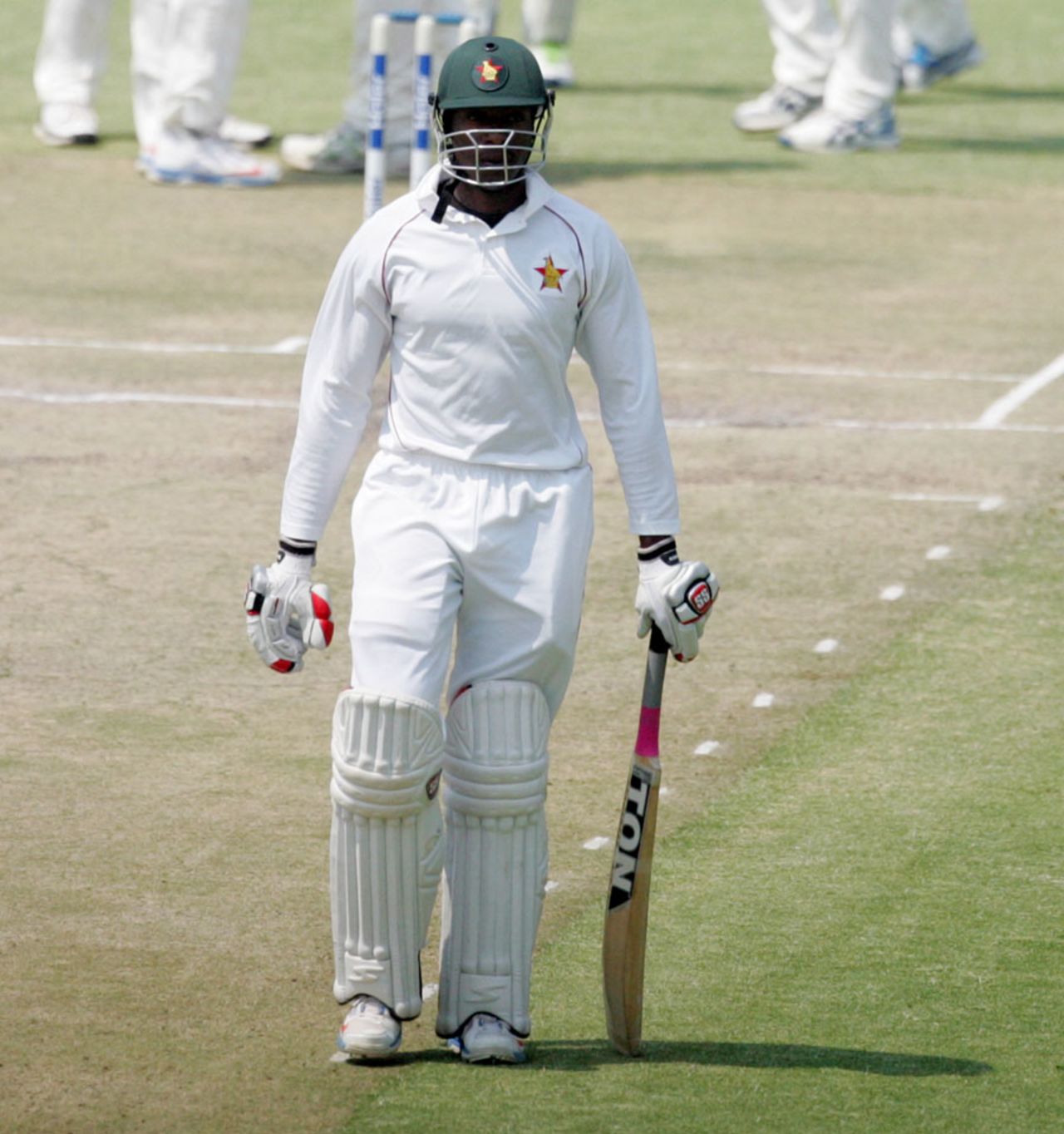 Vusi Sibanda walks off the pitch after losing his wicket, Zimbabwe v Pakistan, 2nd Test, Harare, 4th day, September 13, 2013