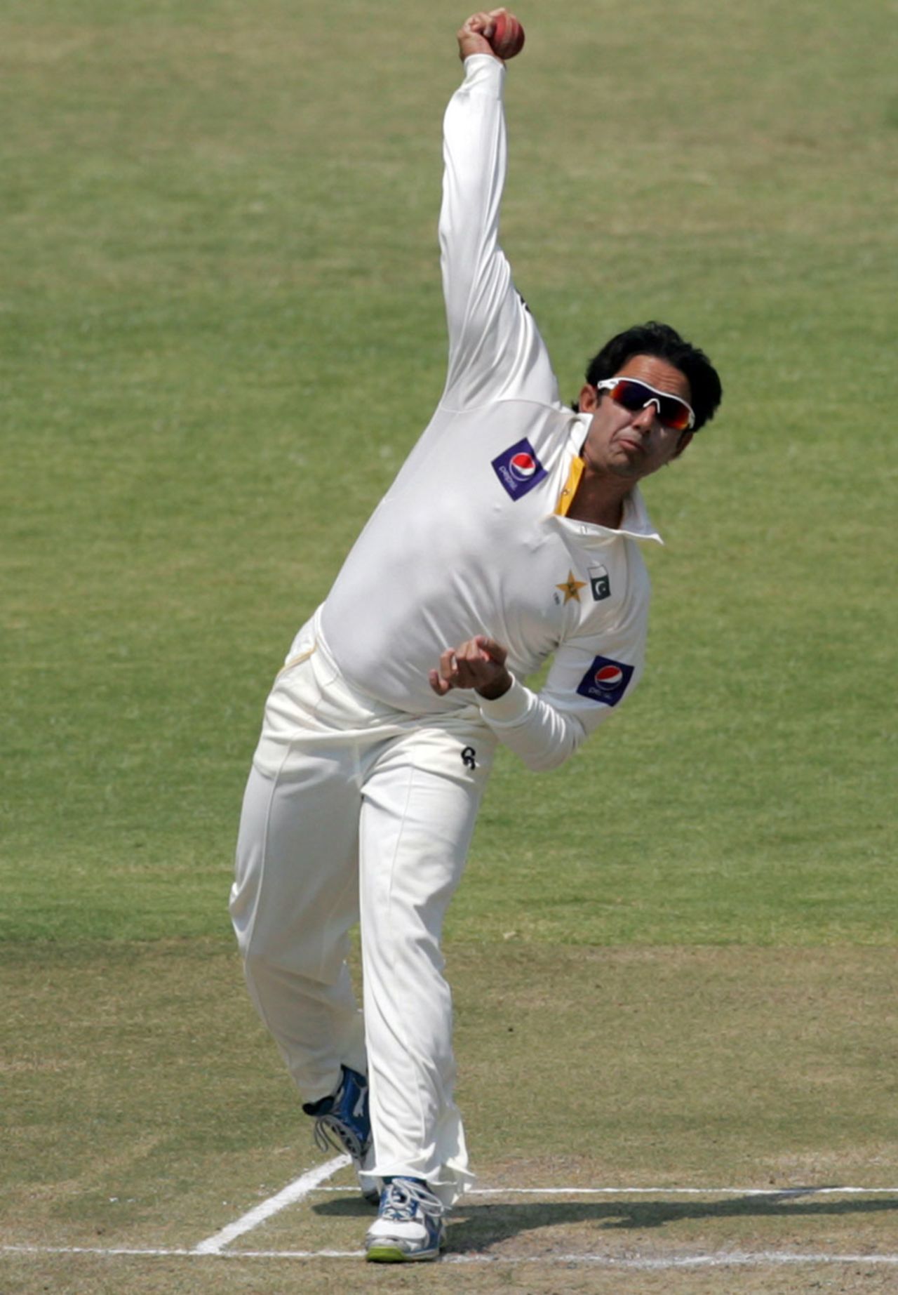 Saeed Ajmal in his delivery stride, Zimbabwe v Pakistan, 2nd Test, Harare, 4th day, September 13, 2013