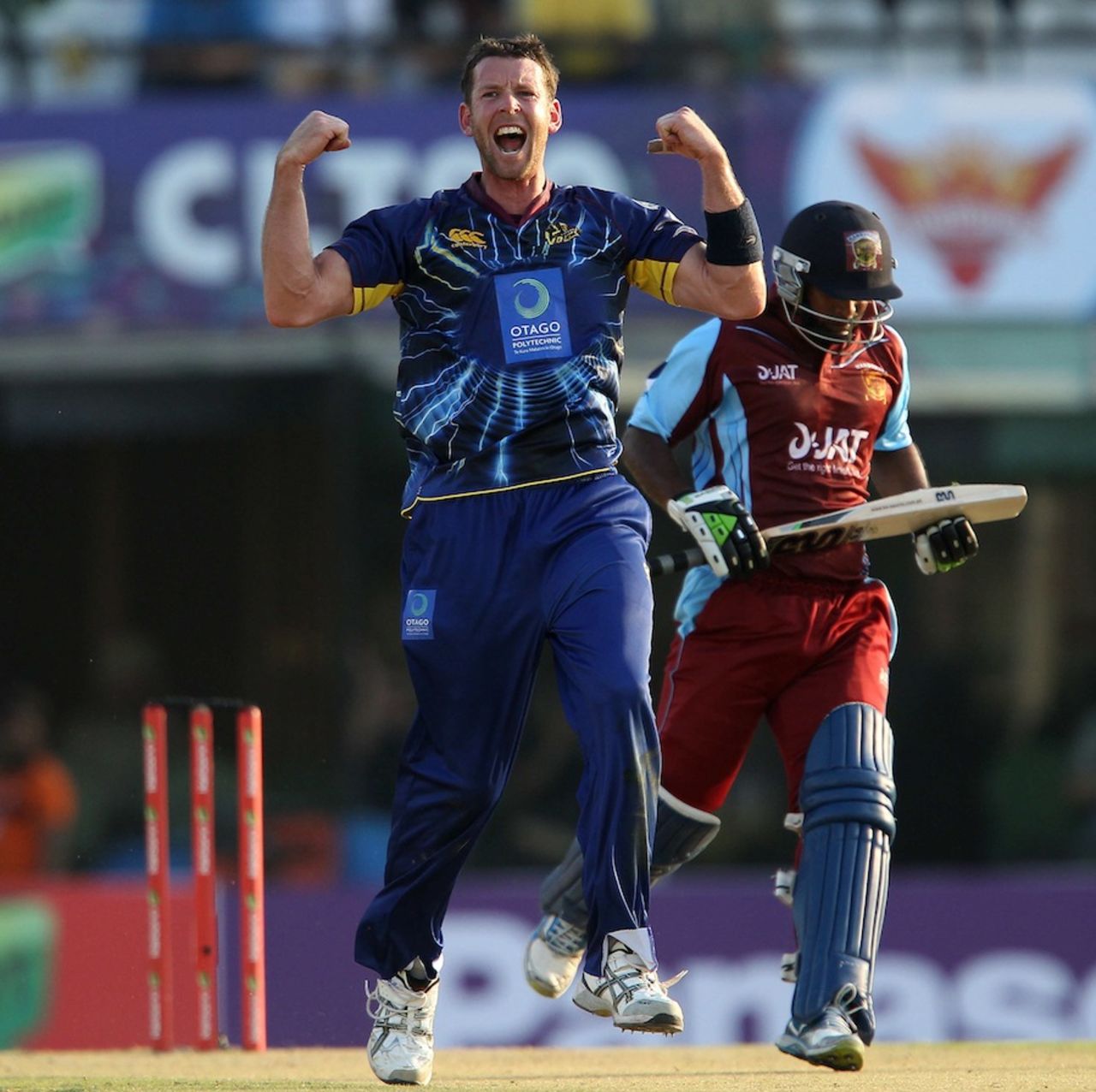 Ian Butler is pumped after trapping Chamara Silva in front, Kandurata Maroons v Otago Volts, Champions League qualifiers, Mohali, September 18, 2013
