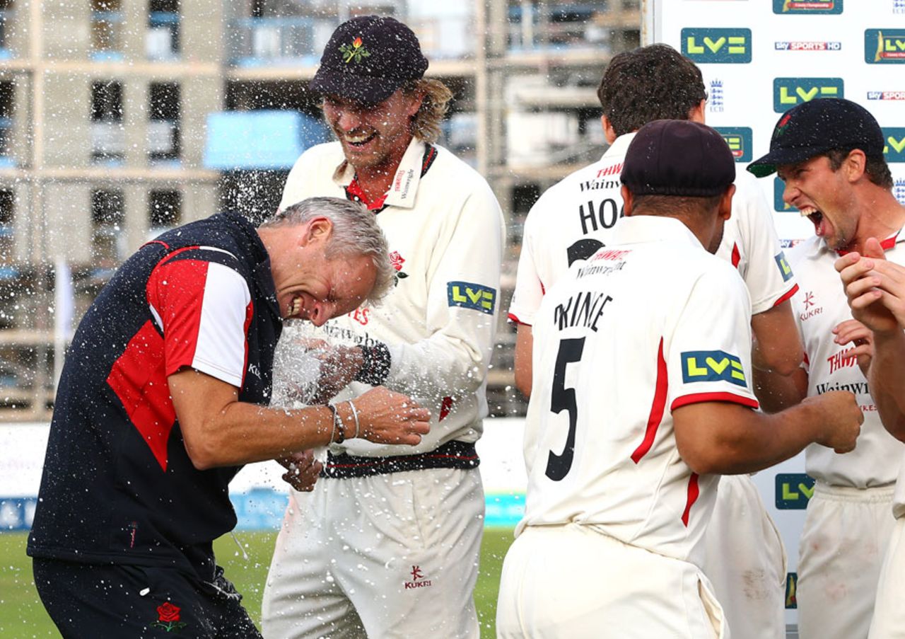 Peter Moores gets a soaking after Lancashire wrapped up the title, Gloucestershire v Lancashire, County Championship, Division Two, Bristol, 4th day, September 20, 2013