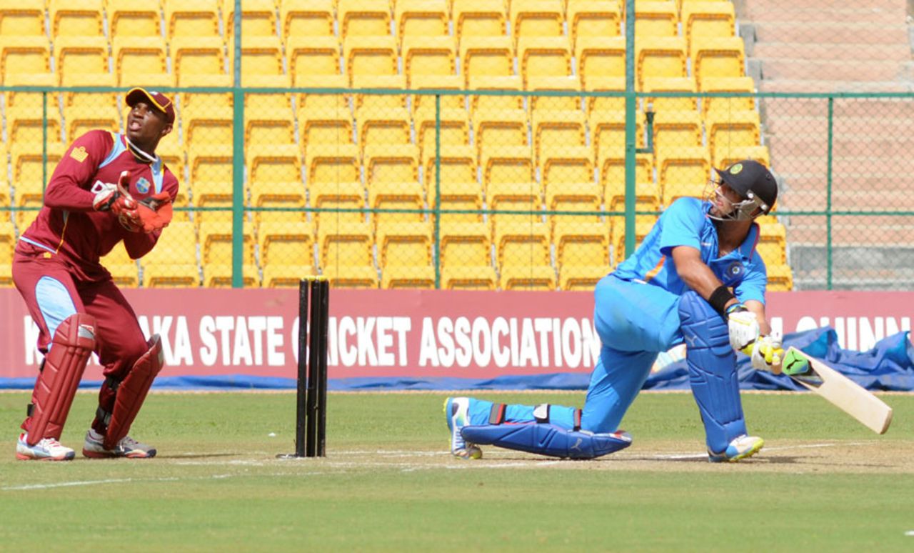 Yuvraj Singh sweeps on his way to 61 off 59 balls, 3rd unofficial ODI, Bangalore, September 19, 2013