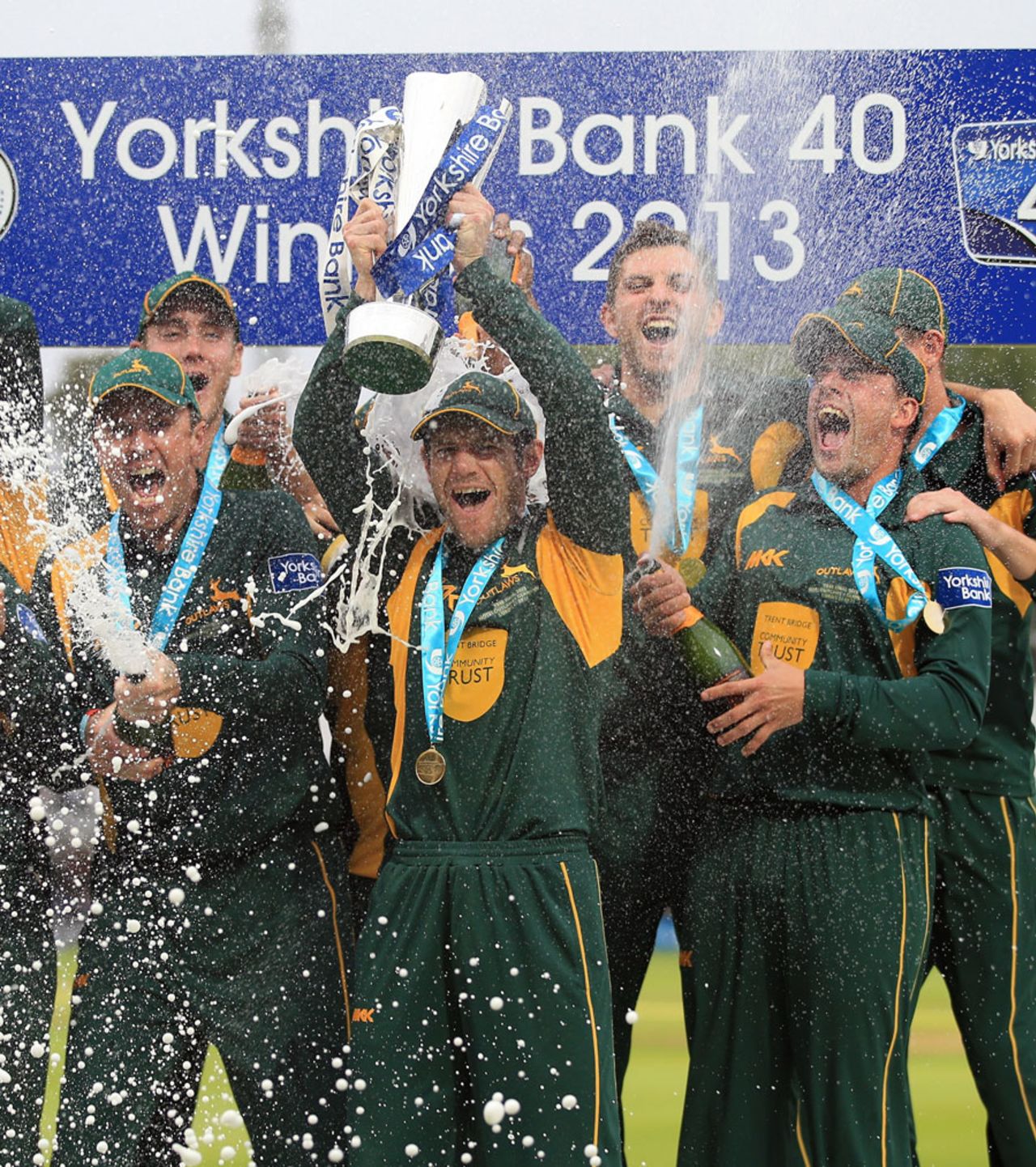 Chris Read lifts the YB40 trophy as the champagne corks pop, Glamorgan v Nottinghamshire, YB40 final, Lord's, September 21, 2013