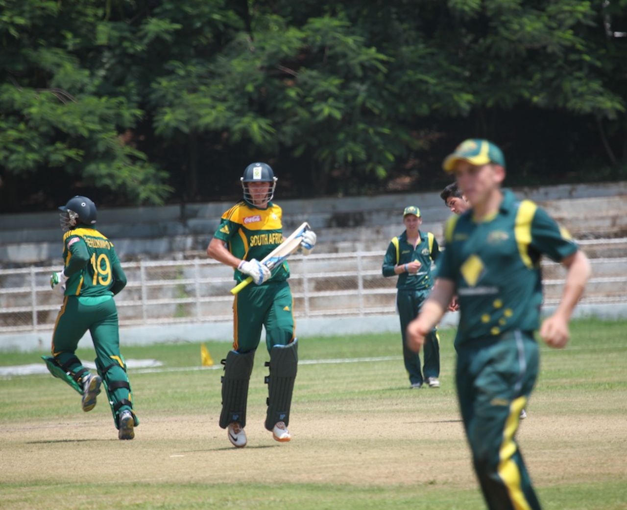Justin Dill and Andile Phehlukwayo take a run, Australia Under-19s v South Africa Under-19s, Visakhapatnam, Sep 23, 2013