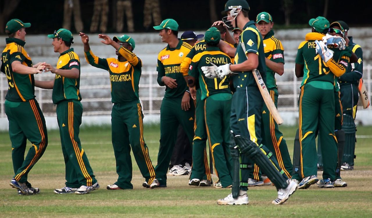 South Africa players celebrate a fall of wicket, Australia Under-19s v South Africa Under-19s, Visakhapatnam, Sep 23, 2013