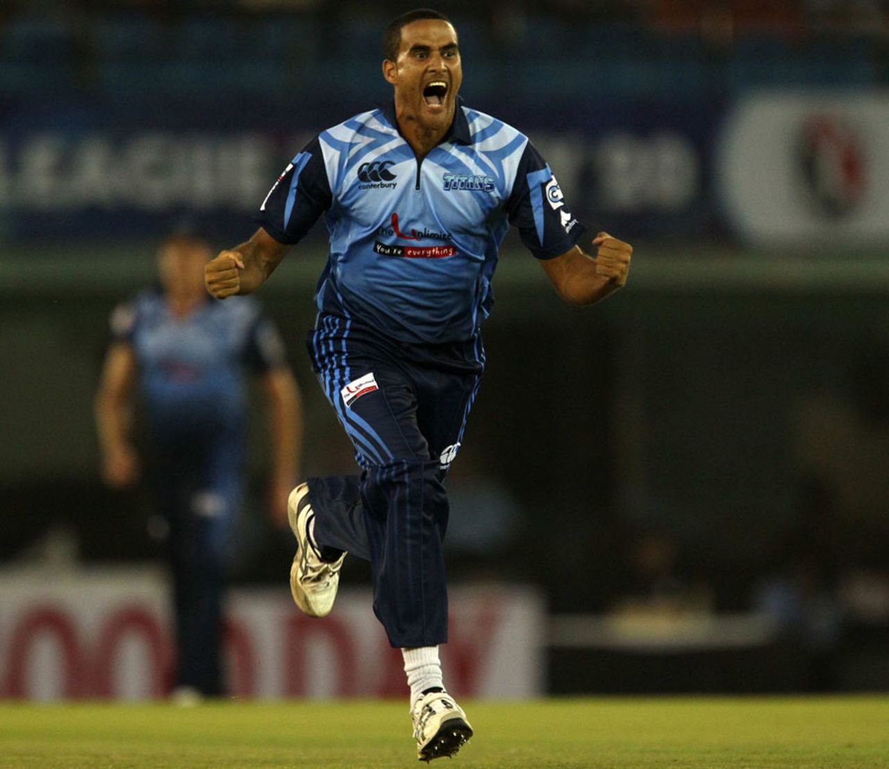Rowan Richards exults after taking a wicket, Brisbane Heat v Titans, Group B, Champions League 2013, Mohali, September 24, 2013