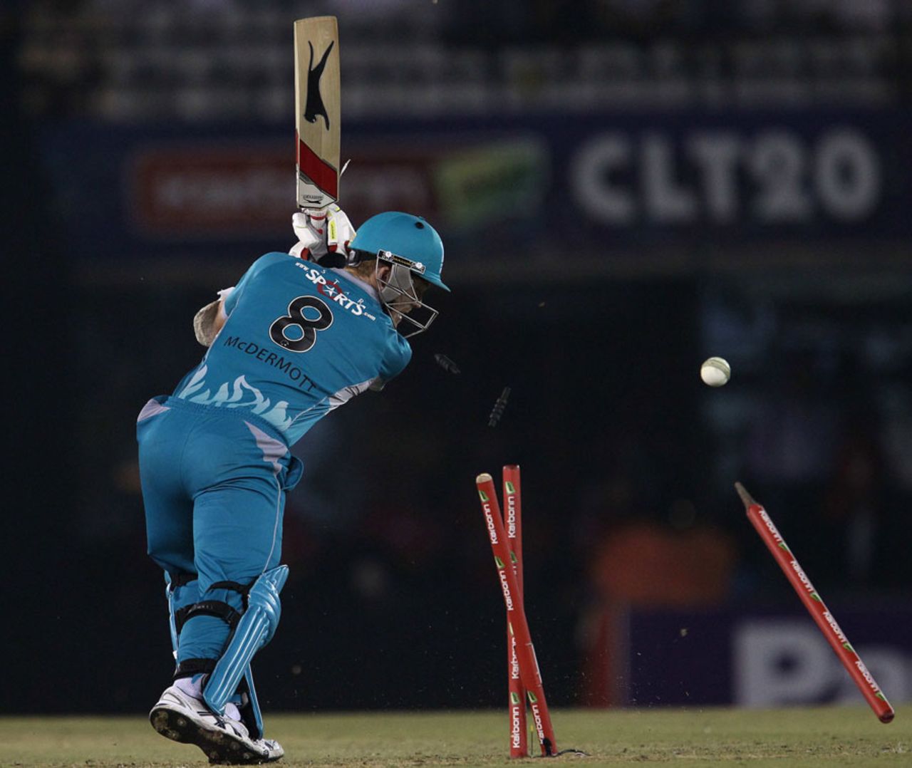 Alister McDermott looks back at his uprooted stumps, Brisbane Heat v Titans, Group B, Champions League 2013, Mohali, September 24, 2013
