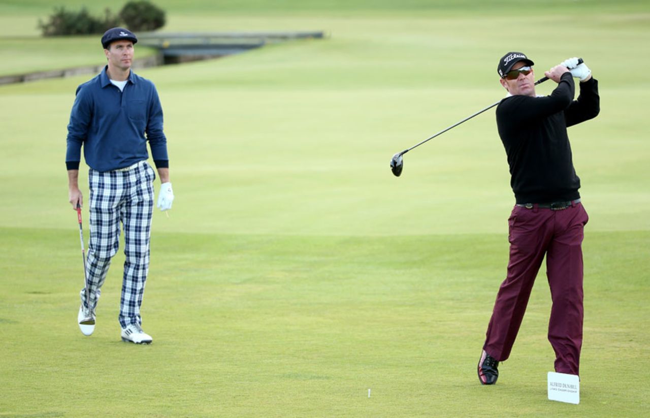 Michael Vaughan and Shane Warne compete in the Alfred Dunhill Links Championship, St Andrews, September 26, 2013