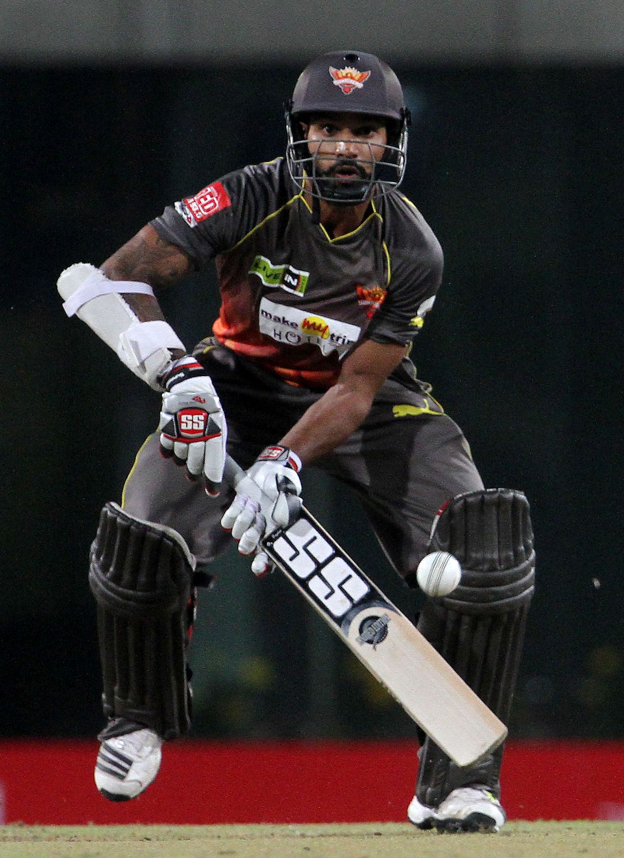 Shikhar Dhawan looks to scoop over the keeper, Chennai Super Kings v Sunrisers Hyderabad, Group B, Champions League 2013, Ranchi, September 26, 2013
