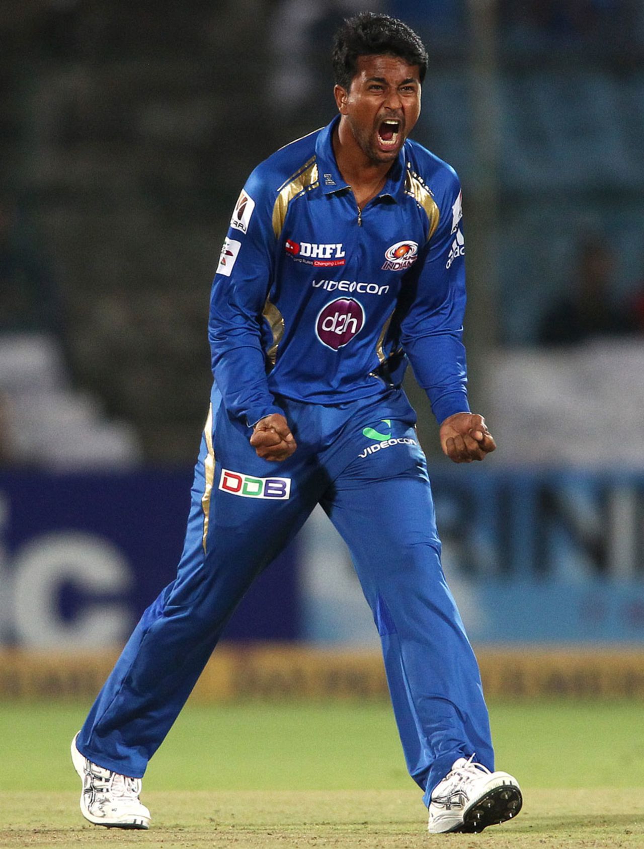 Pragyan Ojha exults after a wicket, Lions v Mumbai Indians, Group A, Champions League 2013, Jaipur, Sep 27, 2013