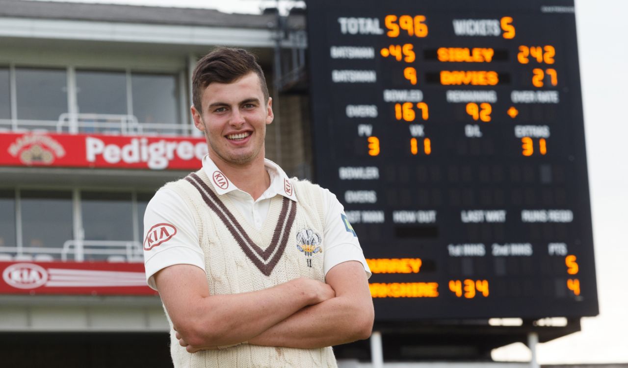 Dominic Sibley poses next to the scoreboard showing his innings, Surrey v Yorkshire, County Championship, Division One, The Oval, September 27, 2013