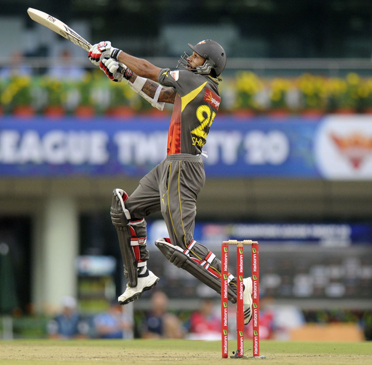 Shikhar Dhawan is airborne while attempting an off-side shot, Titans v Sunrisers Hyderabad, Champions League 2013, Group B, Ranchi, September 28, 2013