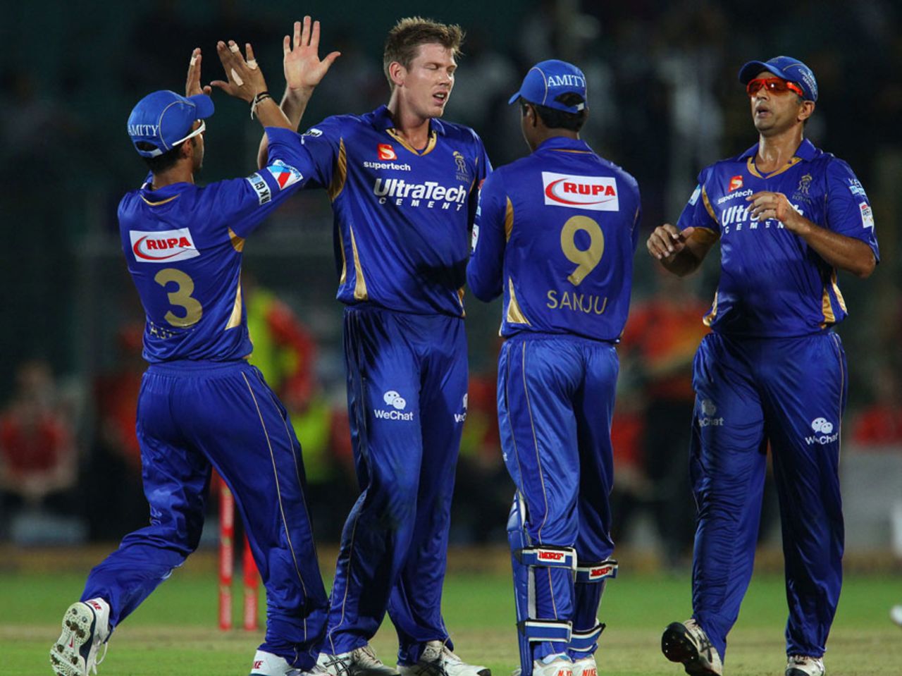 James Faulkner celebrates a wicket with his Rajasthan Royals team-mates, Perth Scorchers v Rajasthan Royals, Group A, Champions League 2013, Jaipur, September 29, 2013