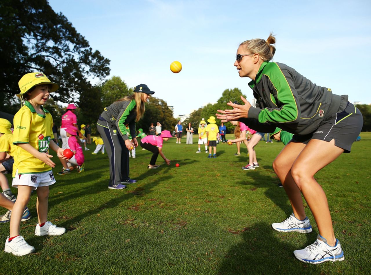 Australia batsman Alyssa Healy plays with kids at a Cricket Australia event, Sydney, September 30, 2013