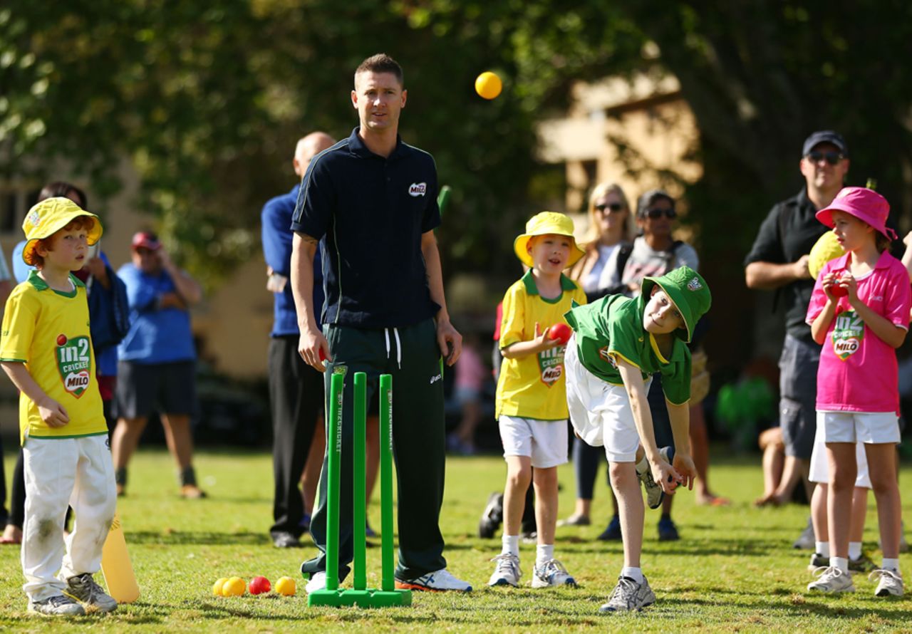 Michael Clarke watches kids show off their bowling skills, Sydney, September 30, 2013