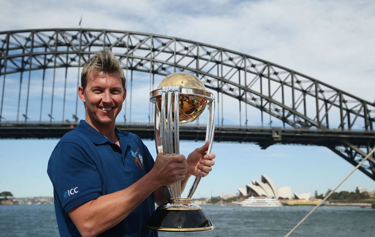 Brett Lee with the ODI World Cup trophy in front of Sydney Harbour Bridge, Sydney, October 2, 2013