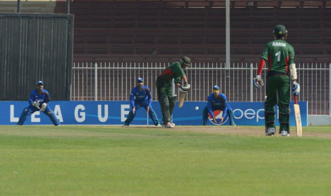 Fifteen-year-old Gurdeep Singh defends the ball, Afghanistan v Kenya, WCL Championship, Sharjah, October 4, 2013