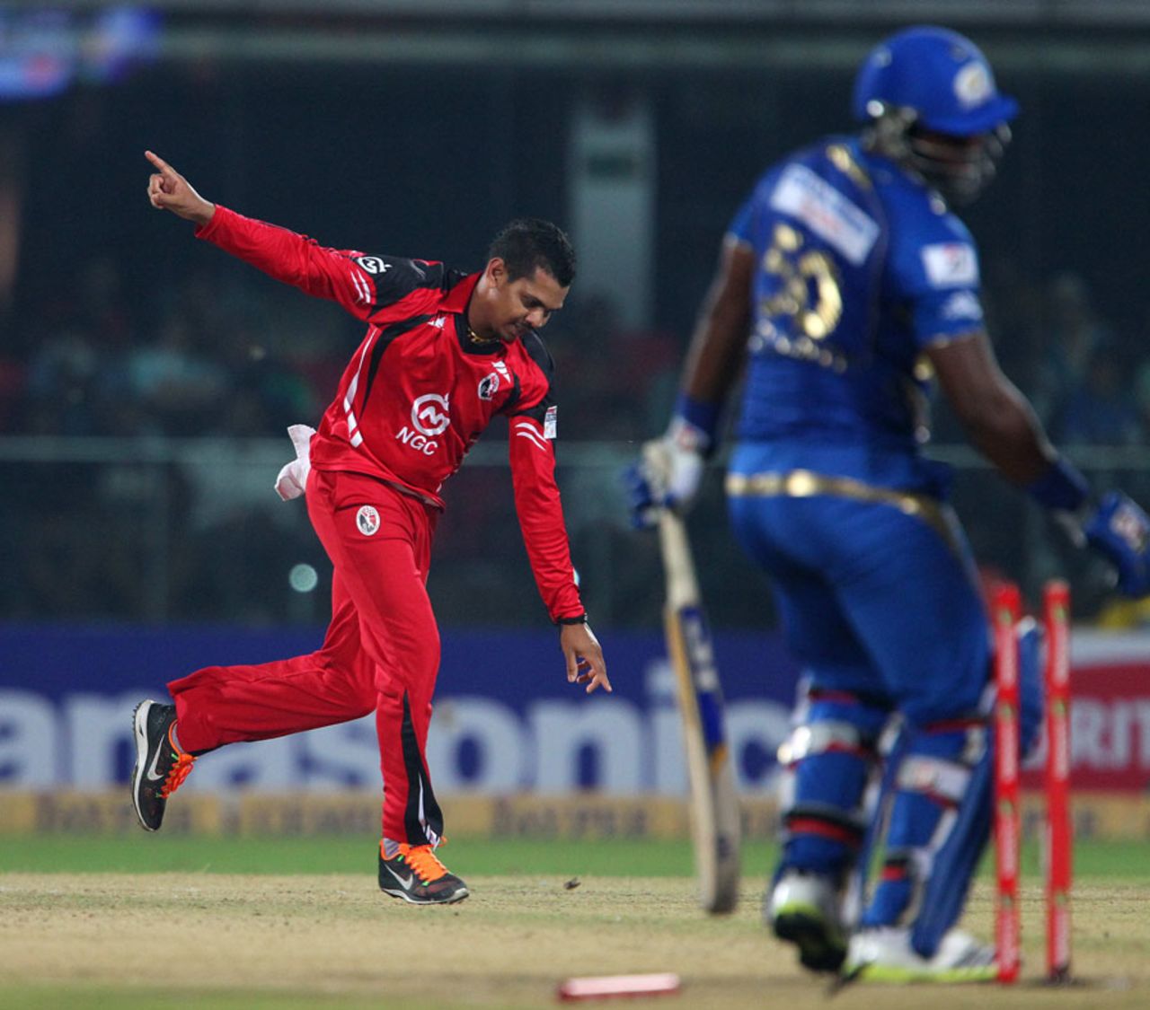 Sunil Narine celebrates Dwayne Smith's wicket, Trinidad & Tobago v Mumbai Indians, Champions League 2013, 2nd Semi-Final, Delhi, October 5, 2013 