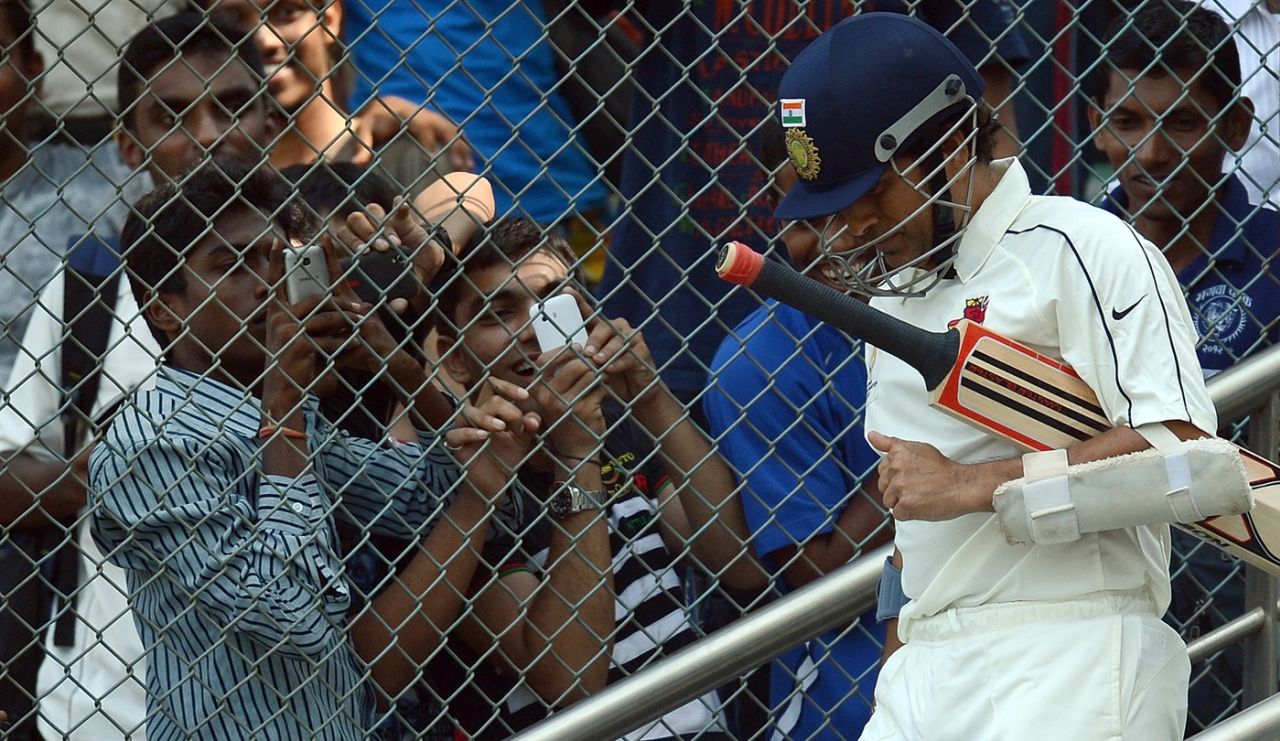 Fans take photographs of Sachin Tendulkar as he walks out to bat, Mumbai v Railways, Ranji Trophy, Group A, 1st day, Mumbai, November 2, 2012