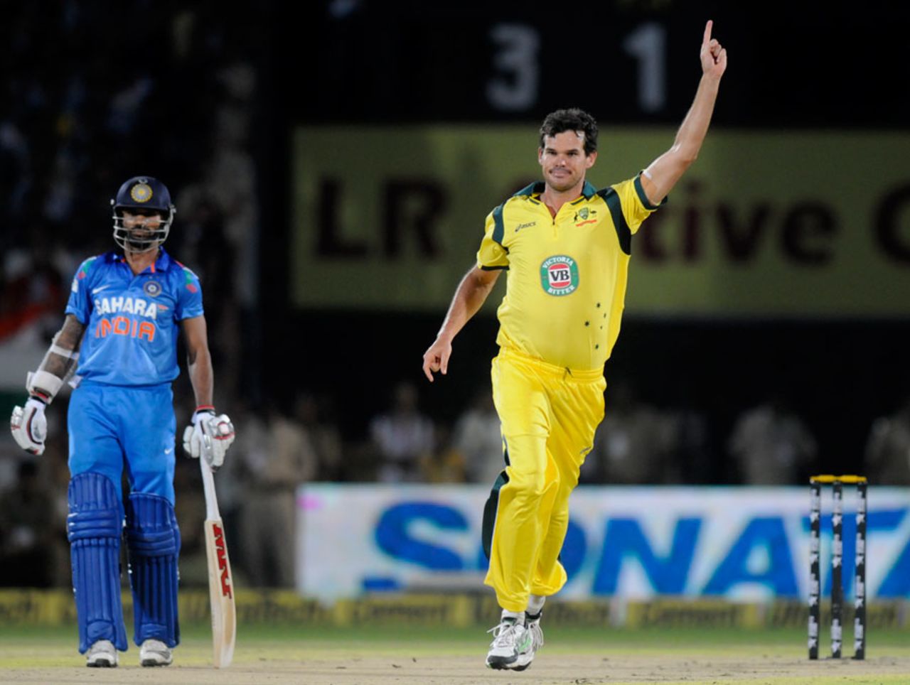 Clint McKay celebrates the fall of a wicket, India v Australia, one-off T20, Rajkot, October 10, 2013