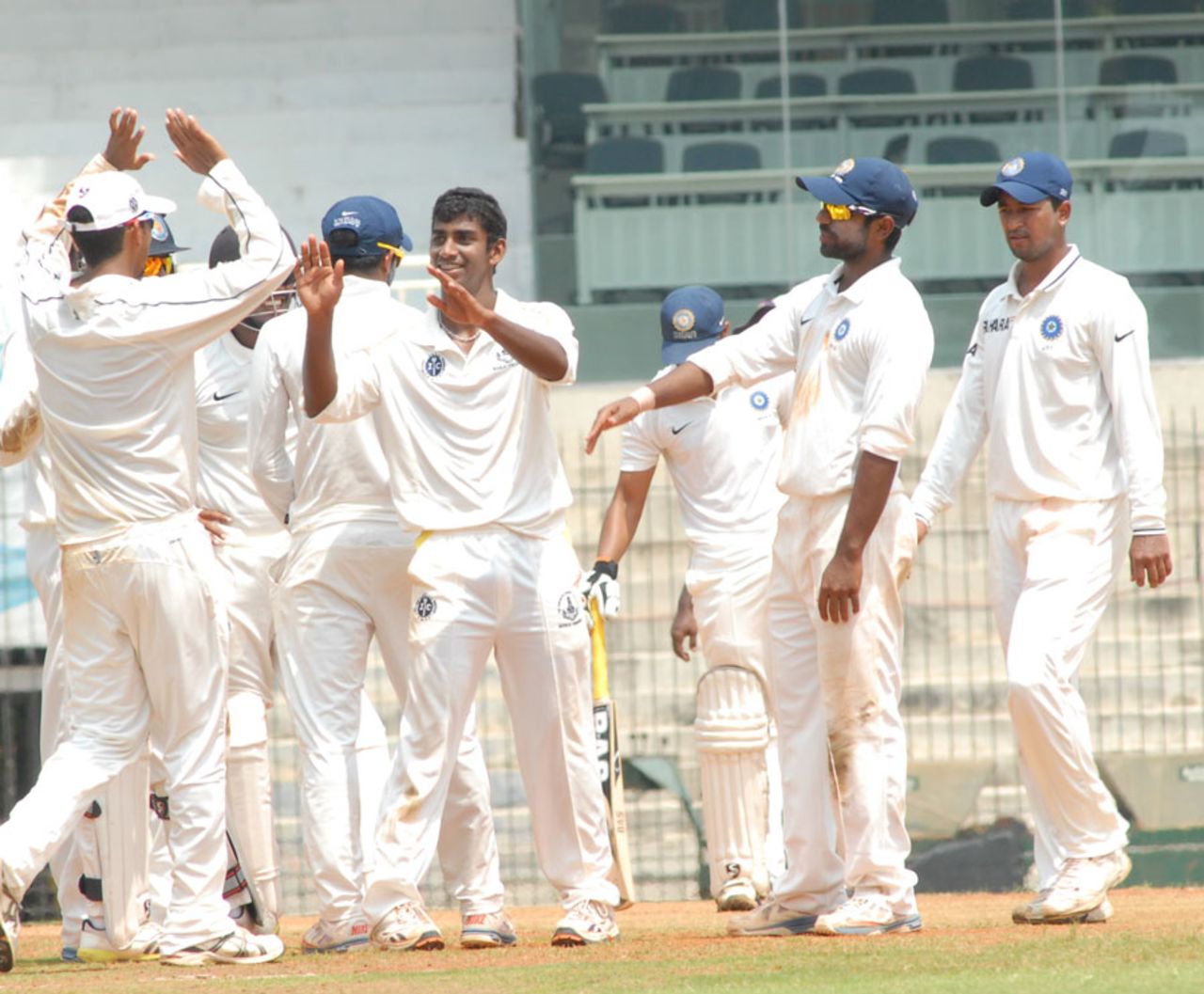 B Aparajith celebrates a wicket with his team-mates, Central Zone v South Zone, Duleep Trophy semi-final, Chennai, 2nd day, October 11, 2013 