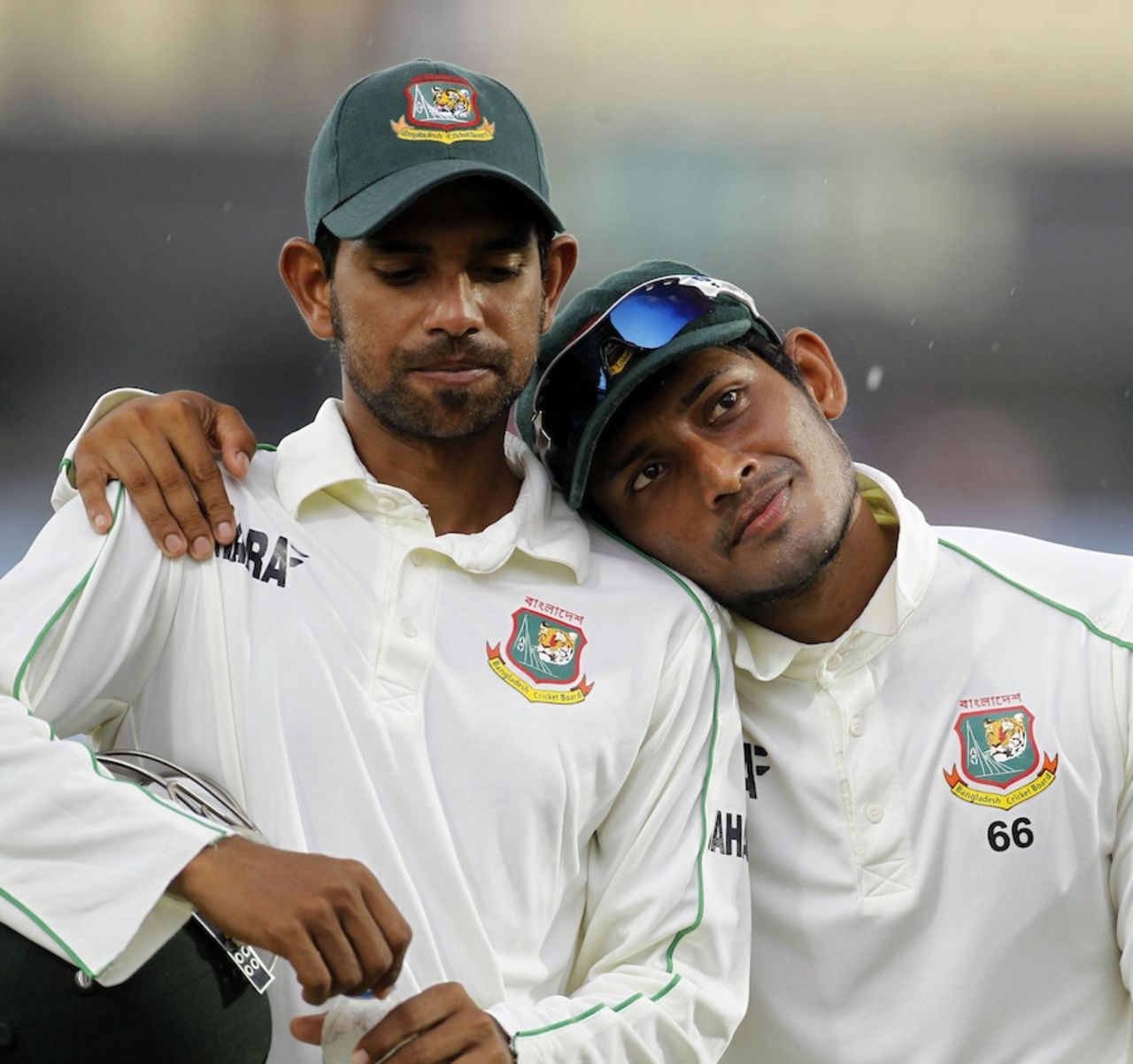 Marshall Ayub and Anamul Haque leave the field as the rains came to disrupt the proceedings, Bangladesh v New Zealand, 1st Test, 4th day, Chittagong, October 12, 2013